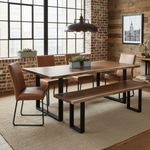 Industrial loft dining space with solid wood live edge dining table and bench in walnut color finish