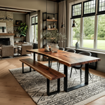 Solid wood live edge dining table in walnut color with black steel legs, placed in bright dining space with wooden cabinet