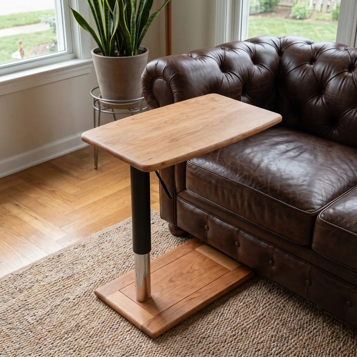 Height adjustable couch laptop table with compact pedestal base
