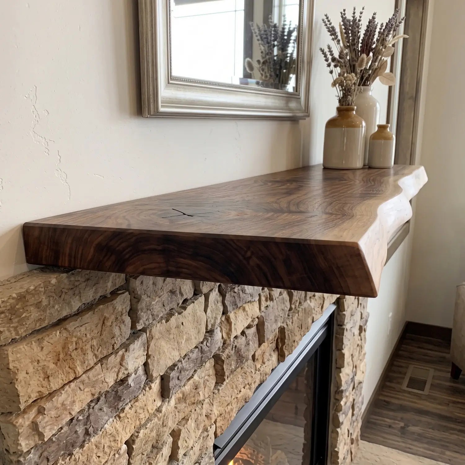 Close-up side view of a solid wood live edge fireplace mantel showing the thick wood profile and natural edge