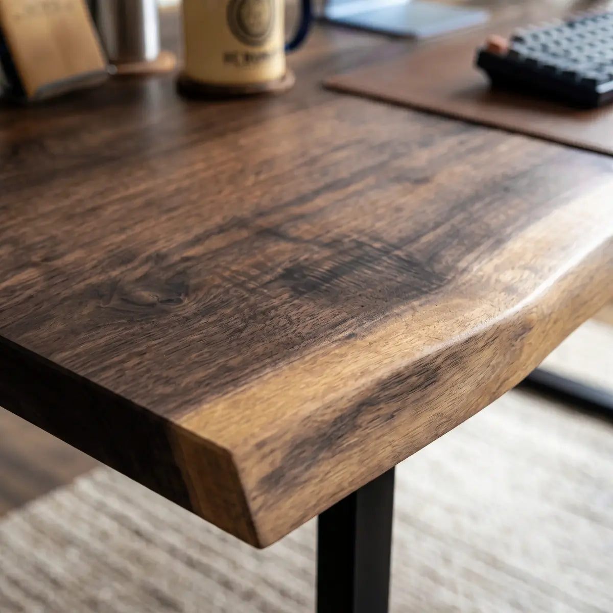 Close-up of 2" solid wood live edge office desk tabletop and natural grain