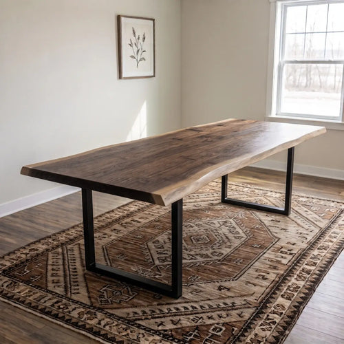 2-inch-thick solid wood live edge dining table with black steel legs