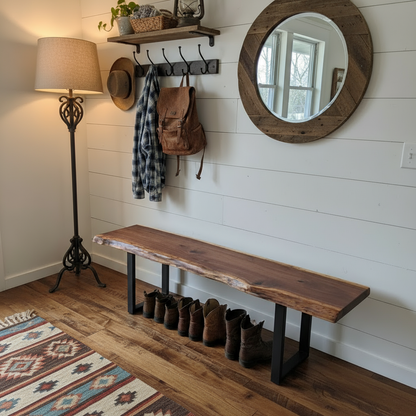 Entryway decor featuring solid wood live edge bench in walnut color beneath a round mirror
